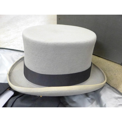 1058 - A morning suit with top hat, 7½, with case