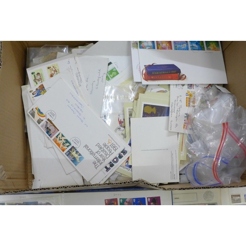 1061 - A box of stamps, covers, etc., loose and in albums