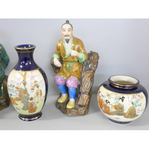 1062 - Three oriental figures, a Japanese Satsuma vase and pot (lacking lid), and a Chinese porcelain ginge... 