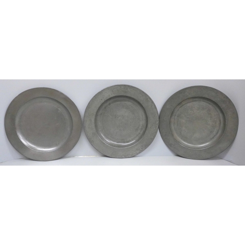 602 - Three pewter plates, all marked London