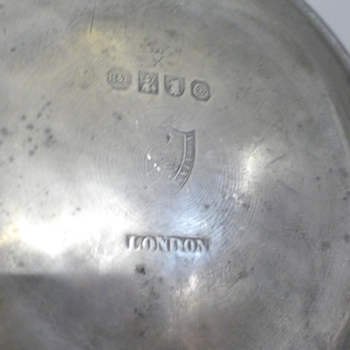 602 - Three pewter plates, all marked London