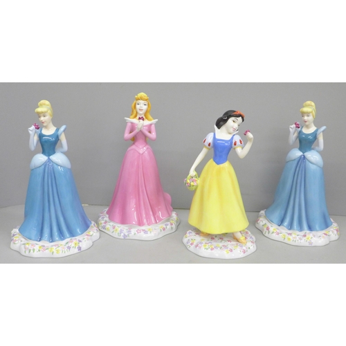 606 - Four Royal Doulton Showcase Collection figures, Cinderella x2, Sleeping Beauty and Snow White, all b... 