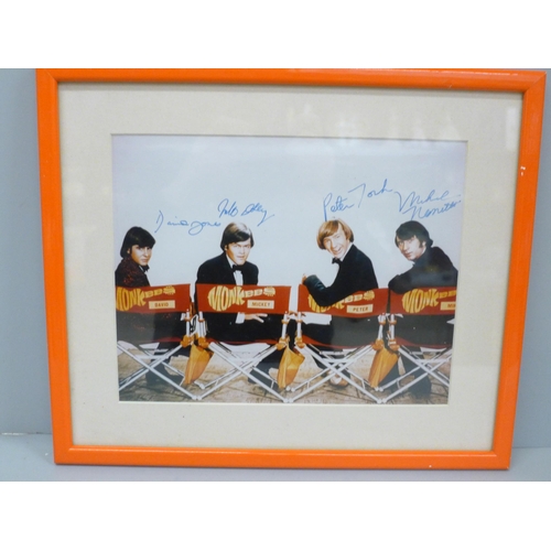 612 - A Monkees signed photograph display, with CoA, frame 33cm wide