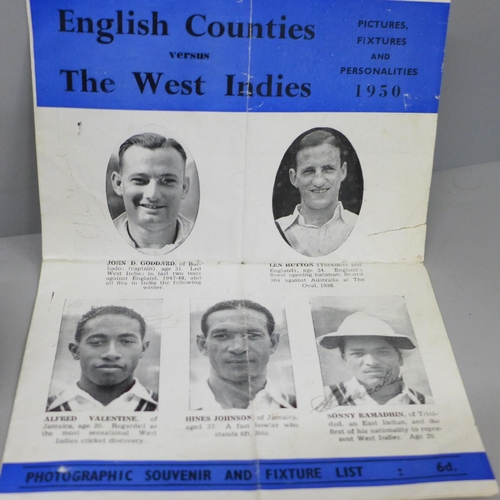 615 - A 1950 English Counties v The West Indies Souvenir, a signed cricket ball, Mike Atherton, and a pock... 