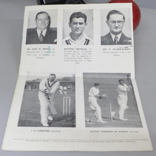 615 - A 1950 English Counties v The West Indies Souvenir, a signed cricket ball, Mike Atherton, and a pock... 