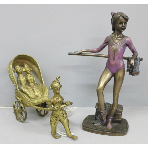 616 - A Dhokra model of a stylised processional Indian cart and a resin figure of a ballerina