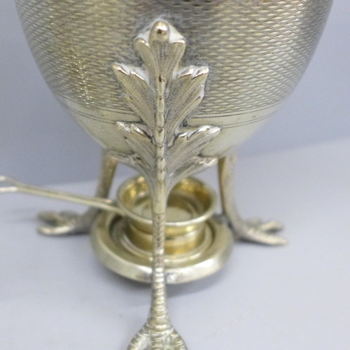 617 - A plated egg warmer by Mappin and Webb, a pair of silver salt spoons, an egg cup and two other spoon... 