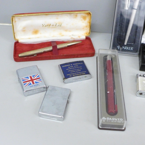 620 - A silver Yard-O-Led ballpoint pen, other pens, lighters, etc.