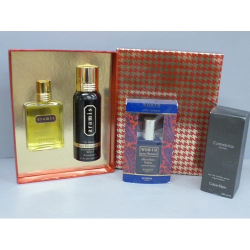 623 - An Aramis after shave set and two others with part contents