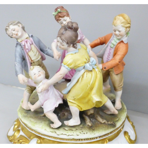 628 - A Capodimonte figure group with Neopolitan stamp, 'Ring a Roses'