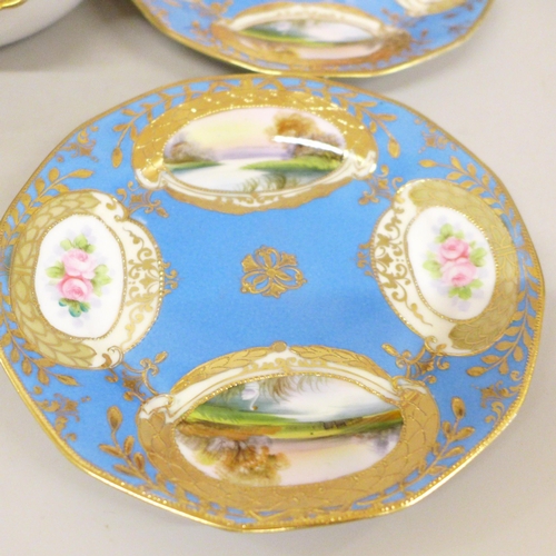 630 - A pair of Noritake plates with landscape scenes to the centre, a set of four plates, each with lake ... 