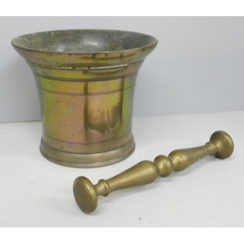 638 - A bronze pestle and mortar