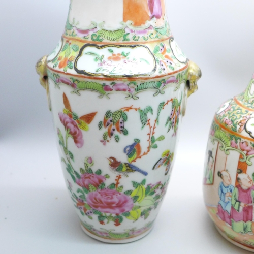 644 - A pair of Chinese famille rose vases, 20cm, and one other Chinese export vase, a/f (restored chip to... 