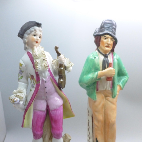 645 - A German porcelain figure of a gentleman a/f, a Victorian Staffordshire temperance figure of a gentl... 