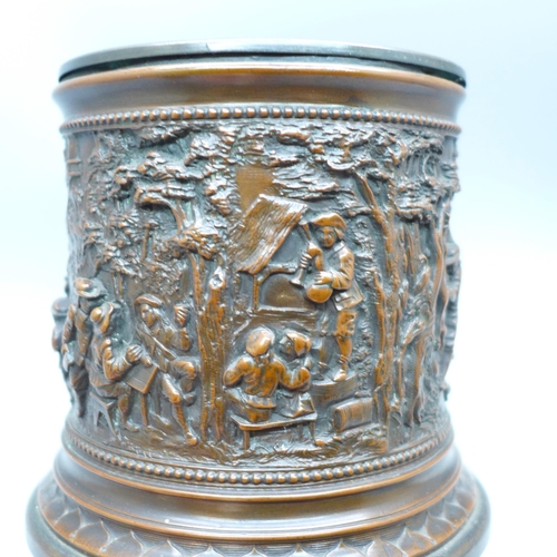 647 - An early 20th Century tobacco jar with detailed scenes, marked T&E, Paris, rim dented