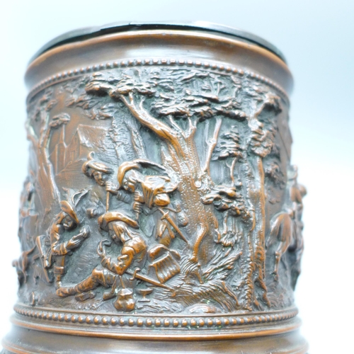 647 - An early 20th Century tobacco jar with detailed scenes, marked T&E, Paris, rim dented