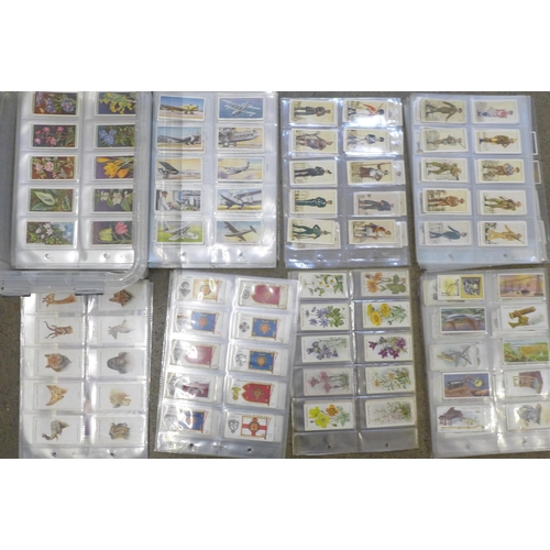 655 - A collection of cigarette cards, (mostly sets)