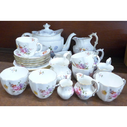 656 - A collection of Royal Crown Derby Posies including five jugs, a tea service with tea pot, sugar bowl... 