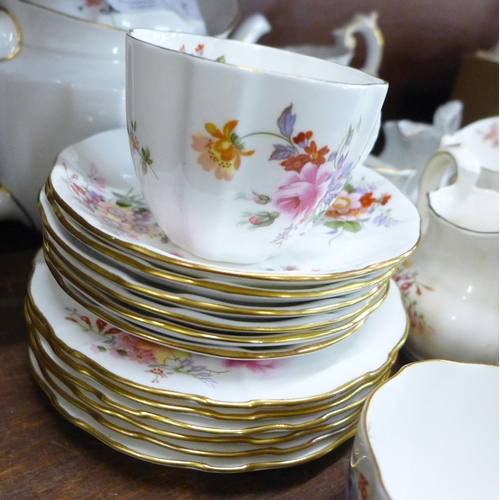 656 - A collection of Royal Crown Derby Posies including five jugs, a tea service with tea pot, sugar bowl... 