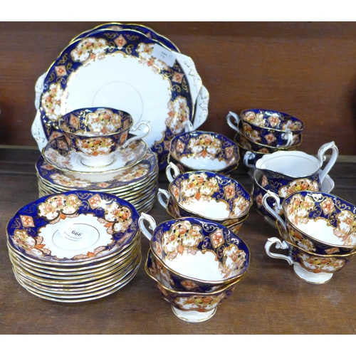 666 - A Royal Albert Heirloom tea set, 12 cups, 11 saucers, 12 side plates, (39 pieces in total)