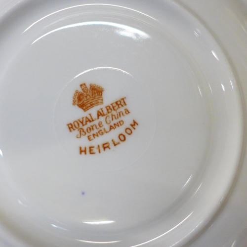 666 - A Royal Albert Heirloom tea set, 12 cups, 11 saucers, 12 side plates, (39 pieces in total)