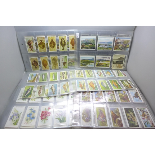 669 - A collection of cigarette cards, (mostly sets)