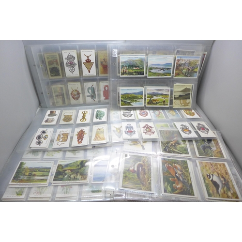 669 - A collection of cigarette cards, (mostly sets)