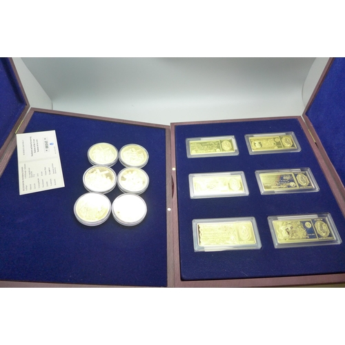 673 - Two cases of gold plated ingots and medals, (6+6)