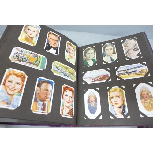 682 - Four albums of cigarette cards