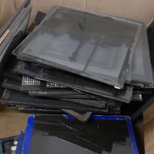 700 - A box of black and white magic lantern slides