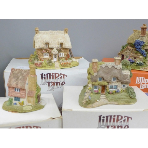 706 - A collection of Lilliput Lane cottages, boxed and with deeds, (12)