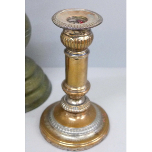 707 - Three candlesticks including one mounted on a wooden plinth