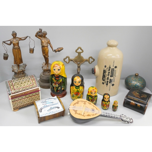 709 - A Russian doll, brass crucifix, foot warmer, a pair of cold painted spelter figures, four decorative... 