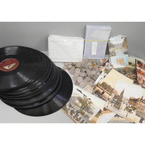 715 - A collection of postcards and 78rpm records