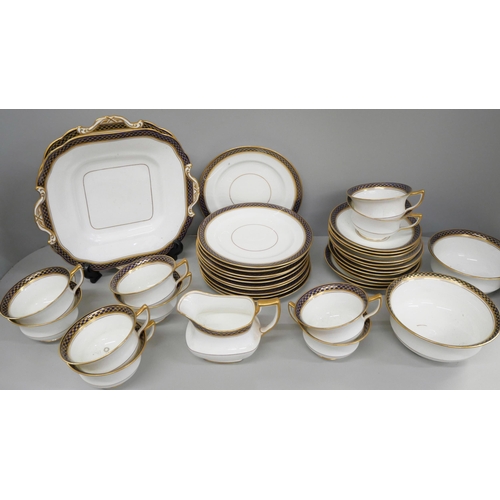 726 - Ainsley tea ware, Darby, Long Row Nottingham retailer, including 9 cups, 12 saucers and 11 side plat... 