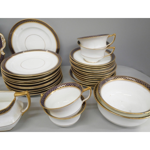 726 - Ainsley tea ware, Darby, Long Row Nottingham retailer, including 9 cups, 12 saucers and 11 side plat... 