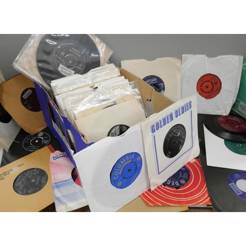 731 - A collection of 1950s and 60s 45rpm records, (100)