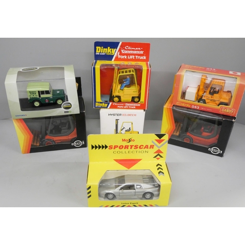 737 - Five boxed model fork-lift trucks including Dinky Toys 404 and two other model vehicles