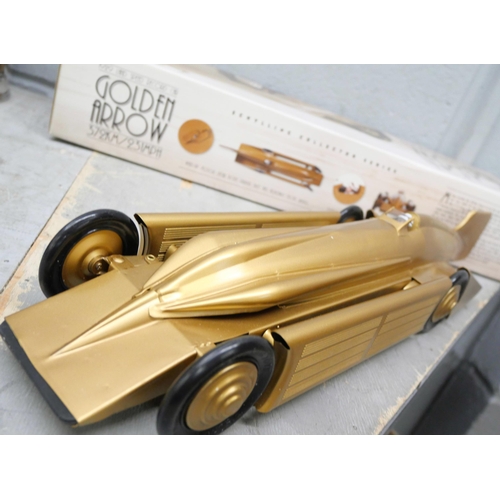 757 - A Schylling Collector Series 1929 Land Speed Record Car, Golden Arrow, and a model of The Titanic