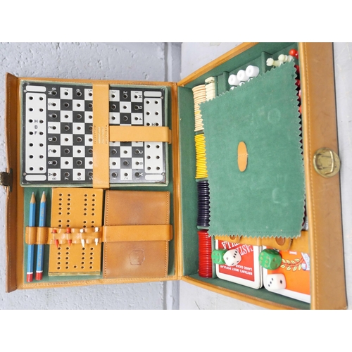 760 - A collection of games including Trivial Pursuit master game, genius edition (sealed), Shut the Box, ... 