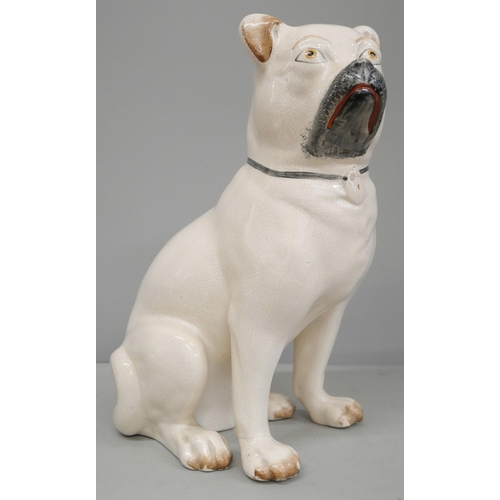 781 - A Staffordshire model of a pug, one foot a/f