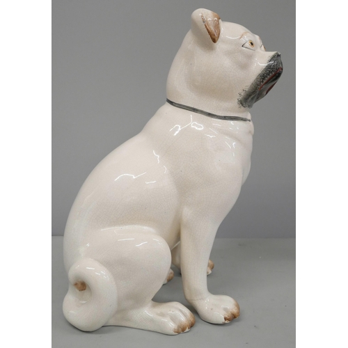 781 - A Staffordshire model of a pug, one foot a/f