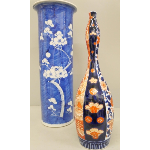 784 - A 19th Century Japanese Imari vase and a Chinese blue and white cylindrical vase, (blue vase 36cm an... 