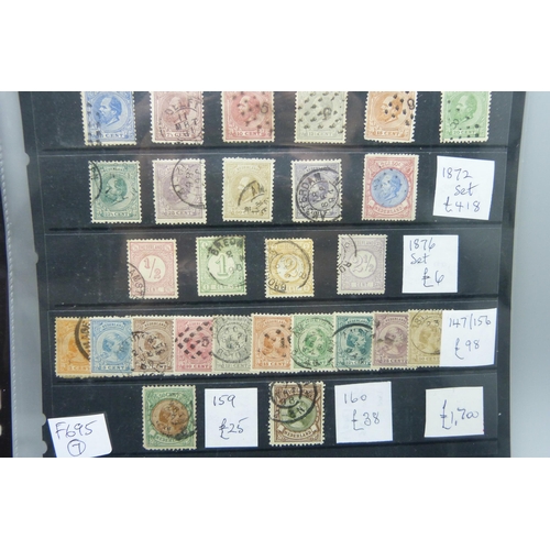 805 - Stamps; a stock sheet of early Netherlands stamps, all identified and catalogued (at approximately £... 