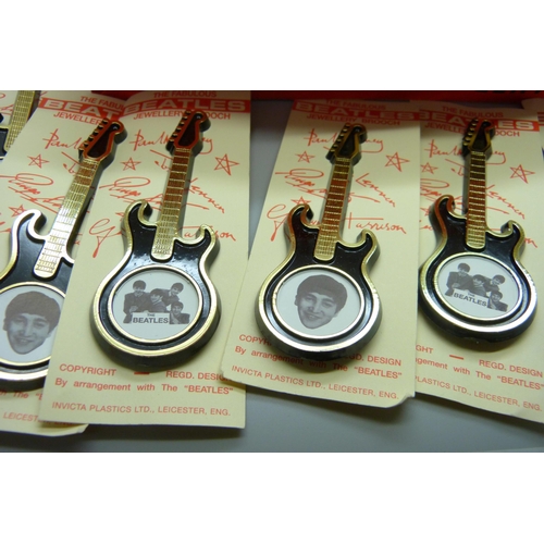 806 - The Beatles, a shop box containing 19 Invicta Plastics guitar brooches on card