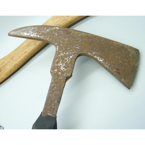 812 - A WWII German foot soldiers axe and a WWII period British fireman's axe