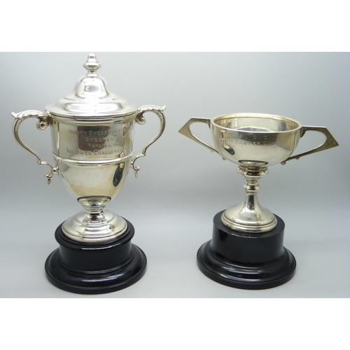 816 - Two silver engraved golf trophies - lidded example Sheffield 1937, and Birmingham 1939, tallest 14cm... 