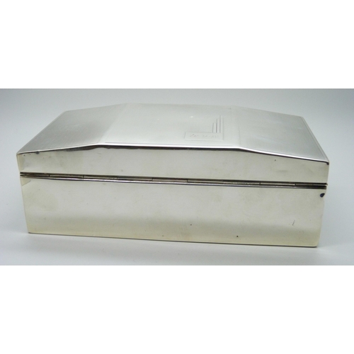 819 - A silver engine turned cigarette box, engraved date on the lid 23/6/37, 16.5 x 8.5cm, a miniature si... 