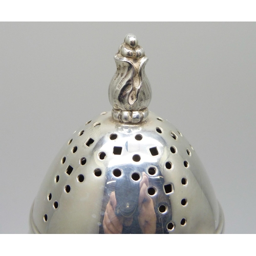 821 - A silver sugar shaker, Birmingham 1936, 13.5cm, 105g, dented