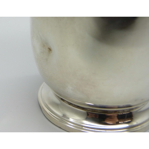 821 - A silver sugar shaker, Birmingham 1936, 13.5cm, 105g, dented